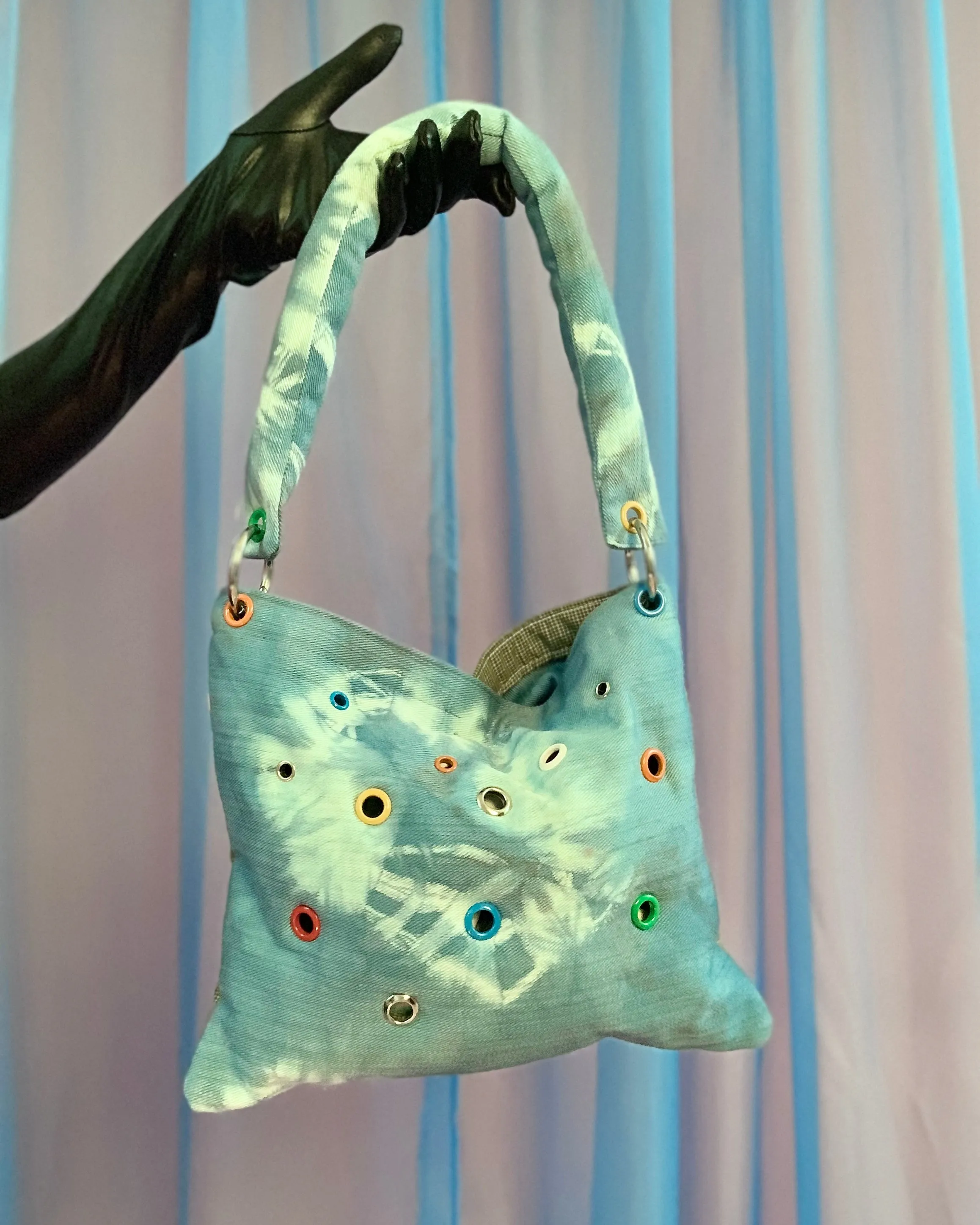 Handmade puff grommet bag