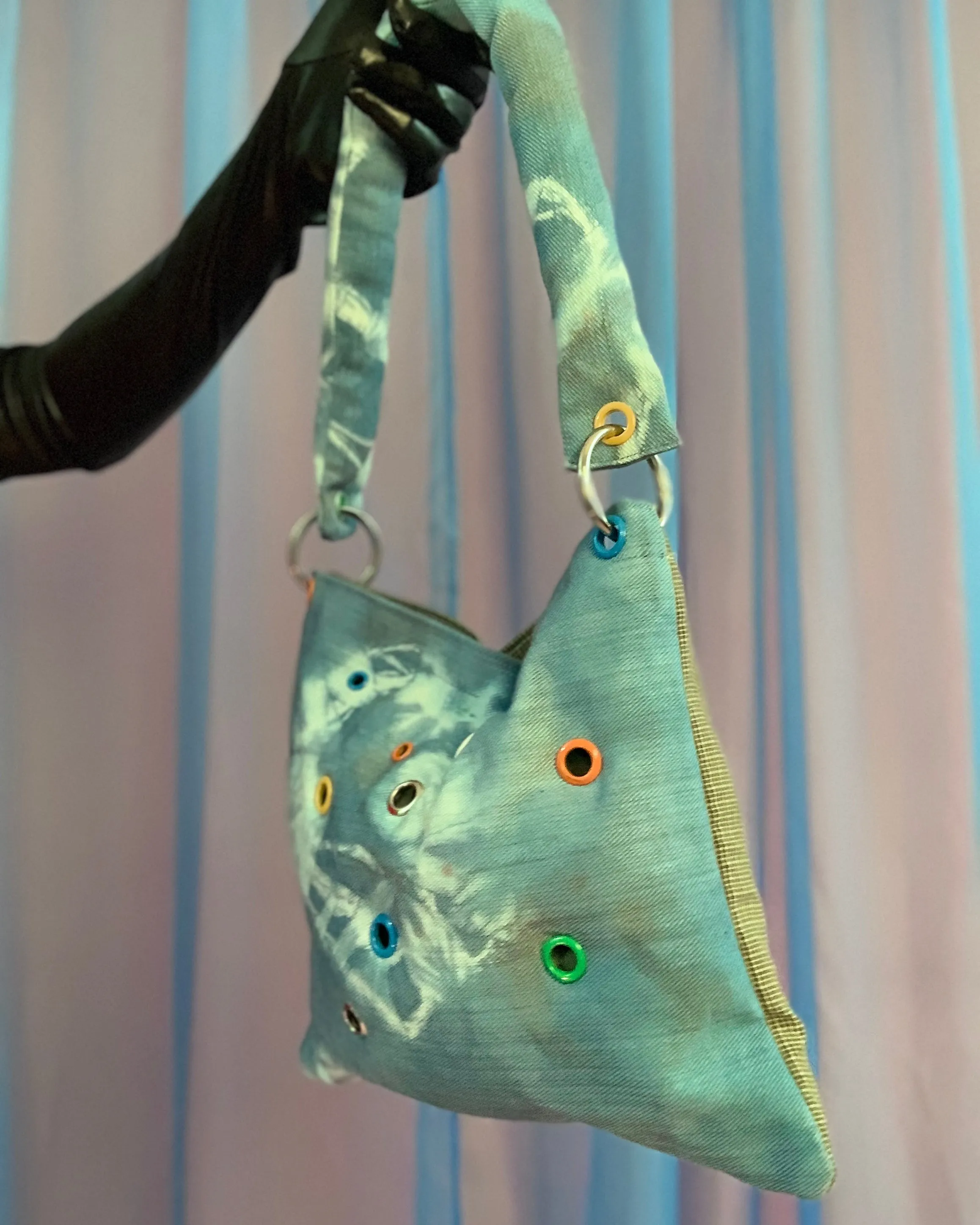 Handmade puff grommet bag