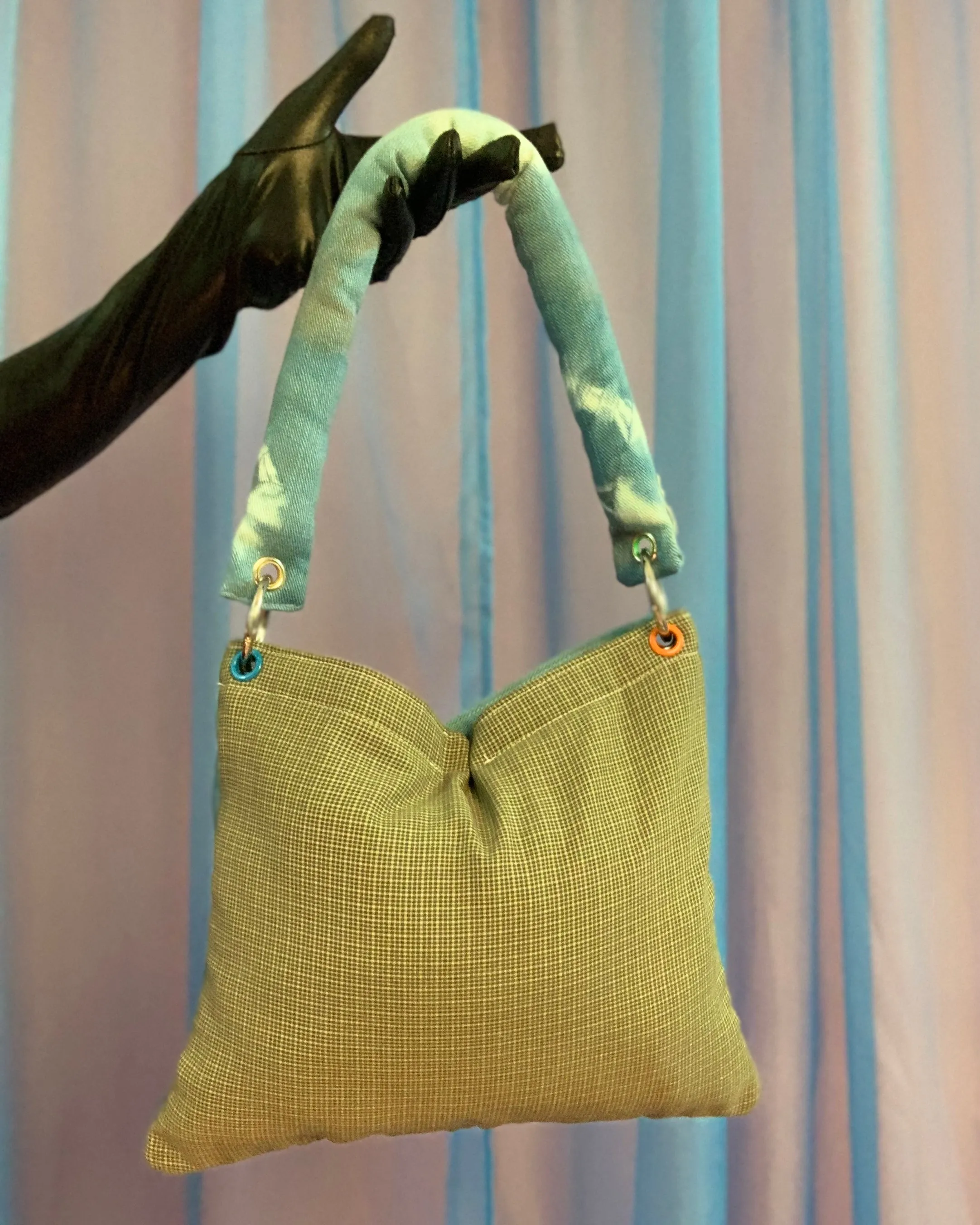 Handmade puff grommet bag