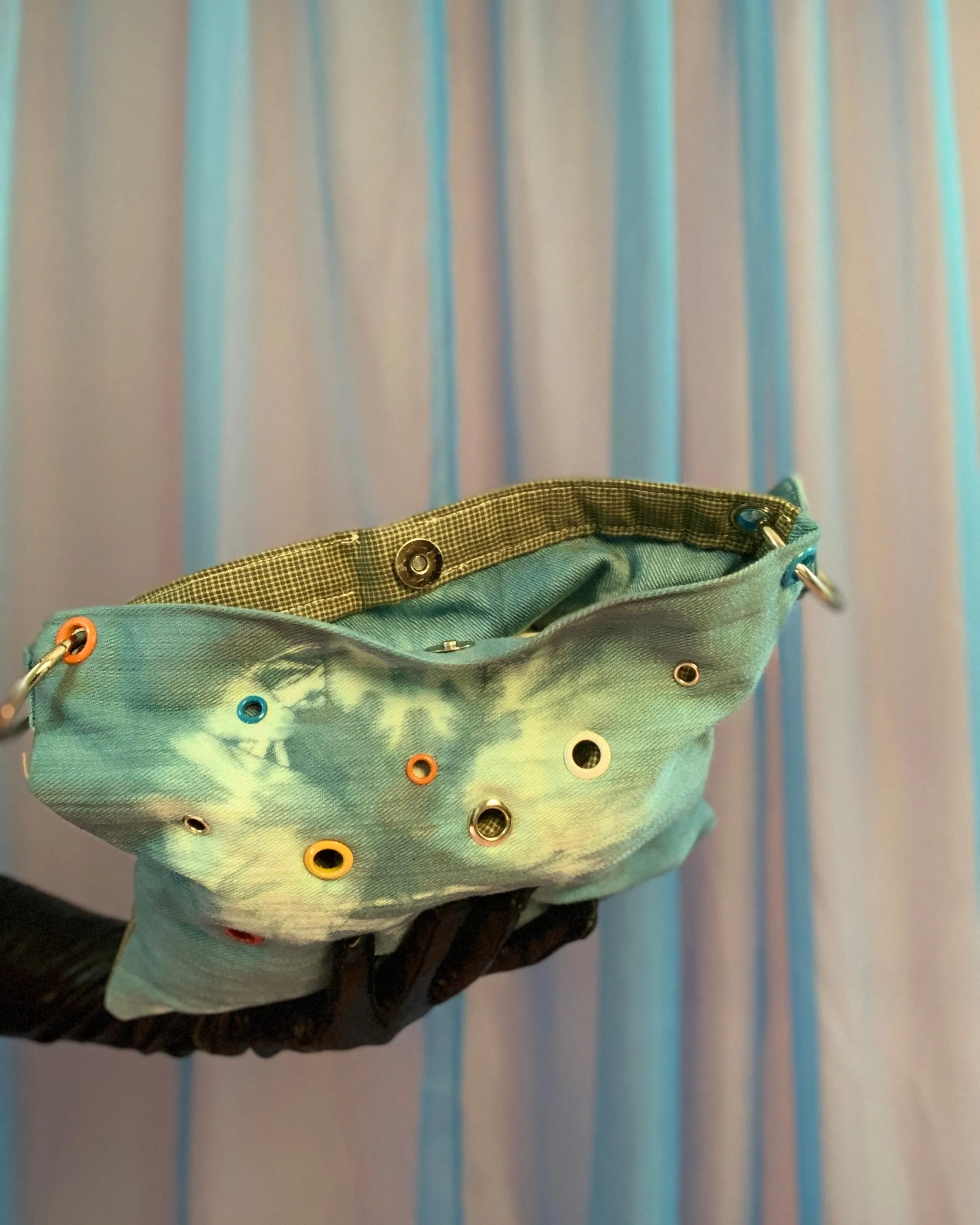 Handmade puff grommet bag