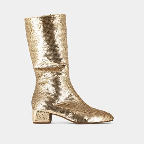 Heeled boots with pointed toe in platinium sequins