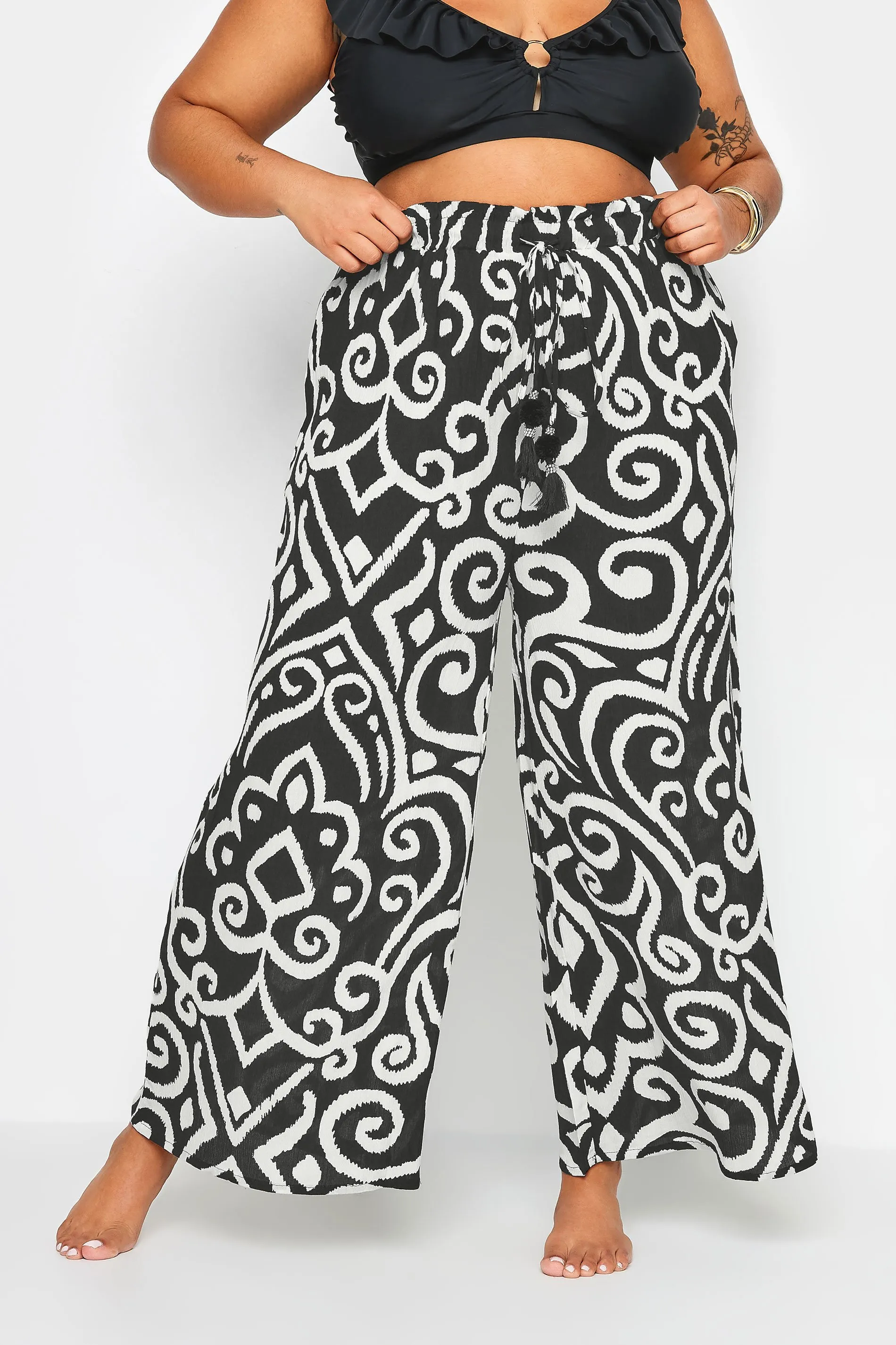 YOURS Curve Black Abstract Print Crinkle Tassel Trousers