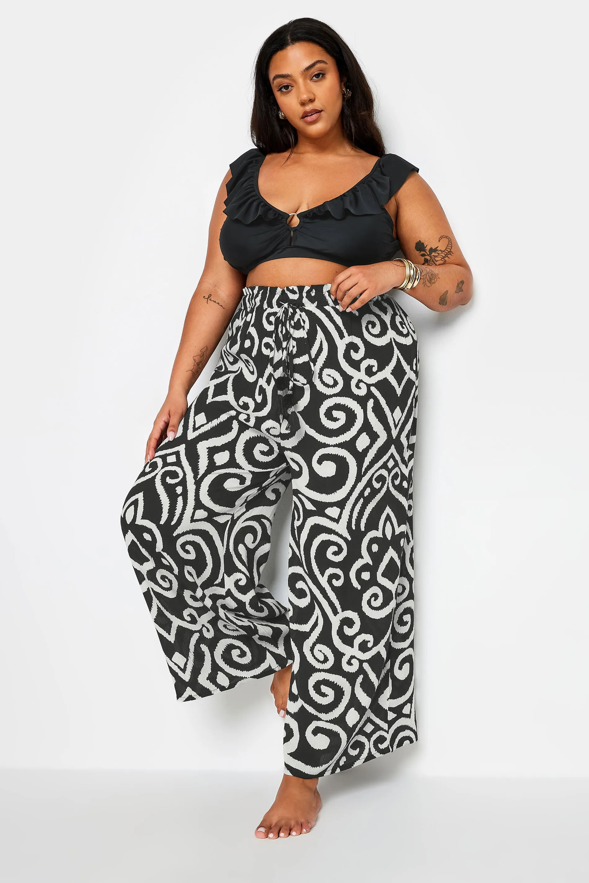 YOURS Curve Black Abstract Print Crinkle Tassel Trousers