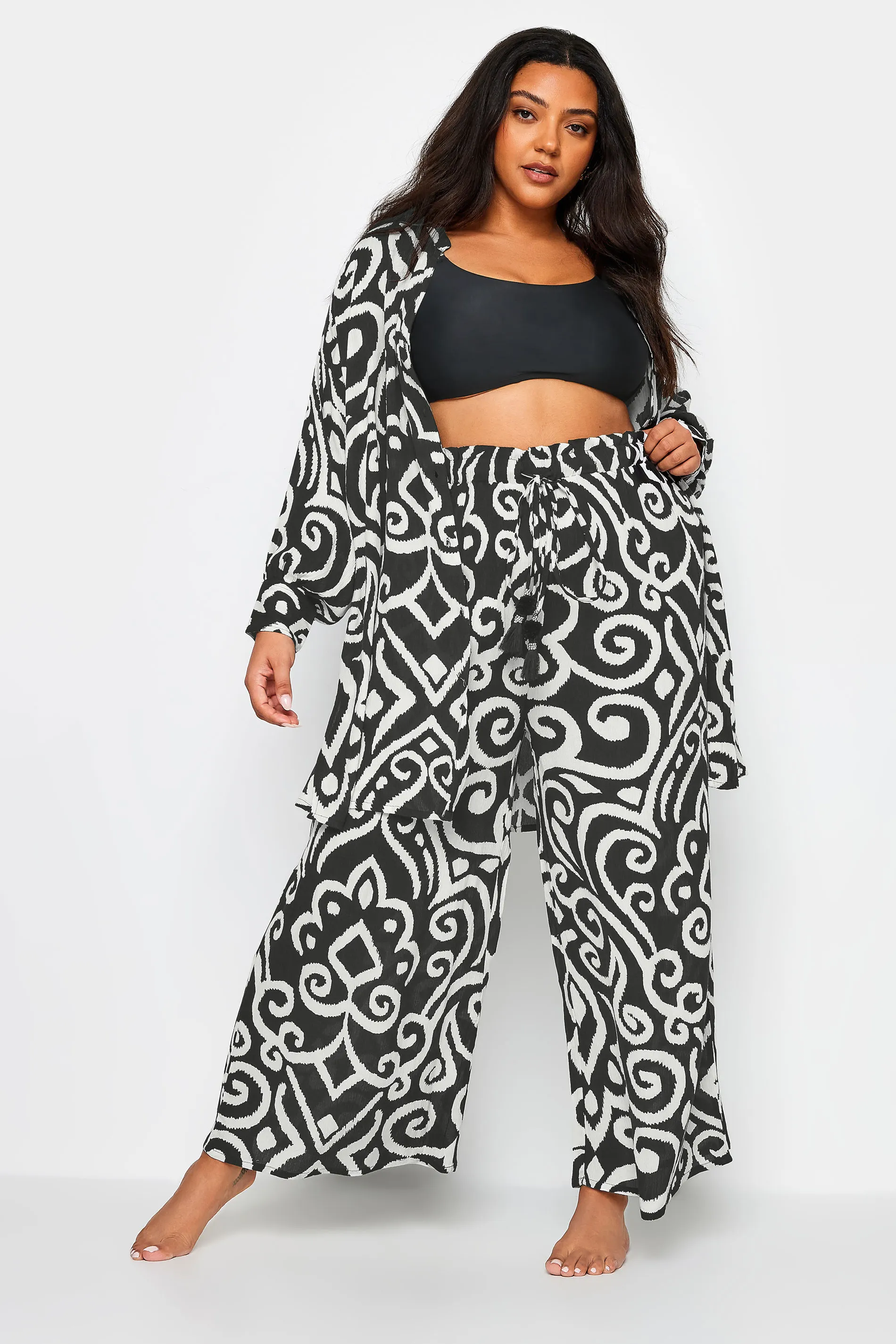 YOURS Curve Black Abstract Print Crinkle Tassel Trousers